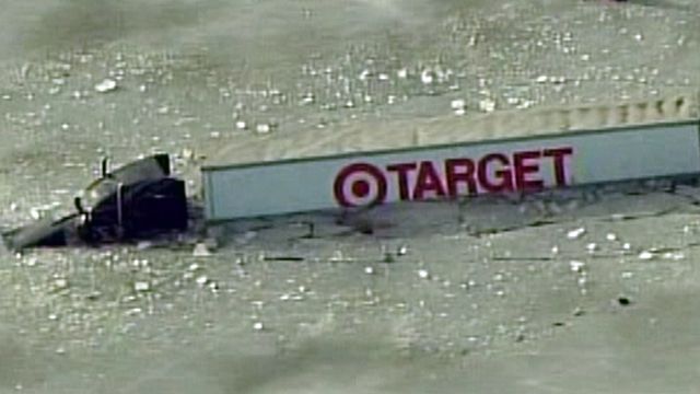 Target Truck Crashes Into Icy Pond