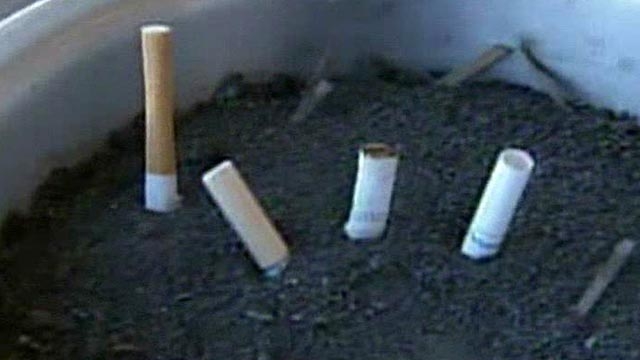 Town Kicks Smokers Off Sidewalks
