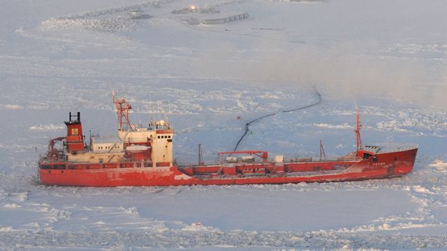 Russian tanker offloads fuel to snow-covered town