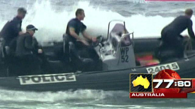 Around the World: Wave flips rescue boat in Australia