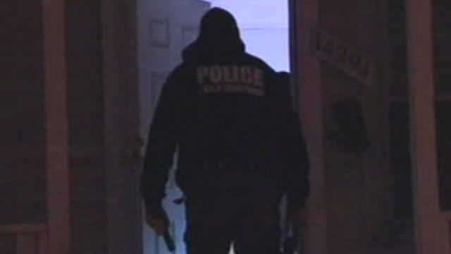 Police Raid Home of Alleged Cop Shooter