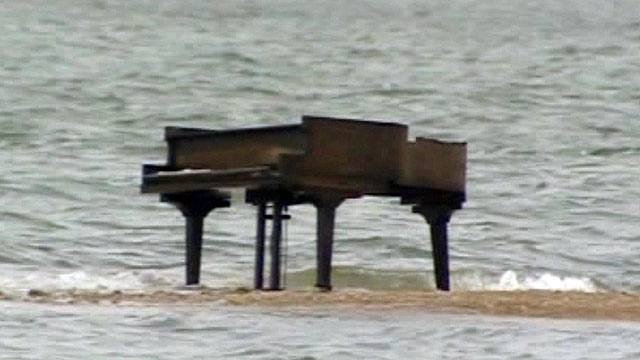 Baby Grand Perched on Sand Barge 