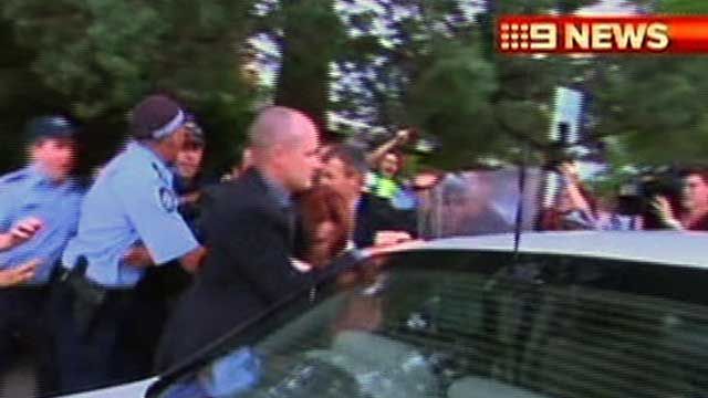 Australia's Prime Minister Escapes Protesters