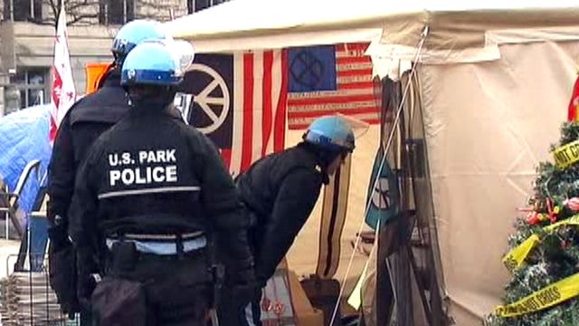 Police officers clear out 'Occupy DC' encampment