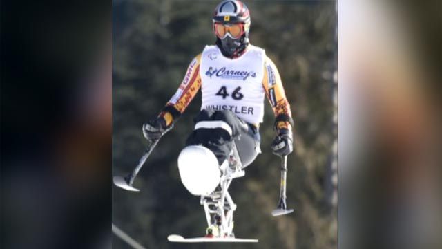 Paraplegic skier lands back flip