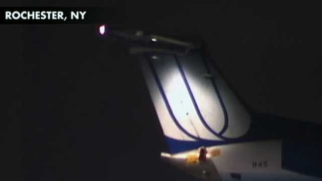 Plane Skids off NY Runway