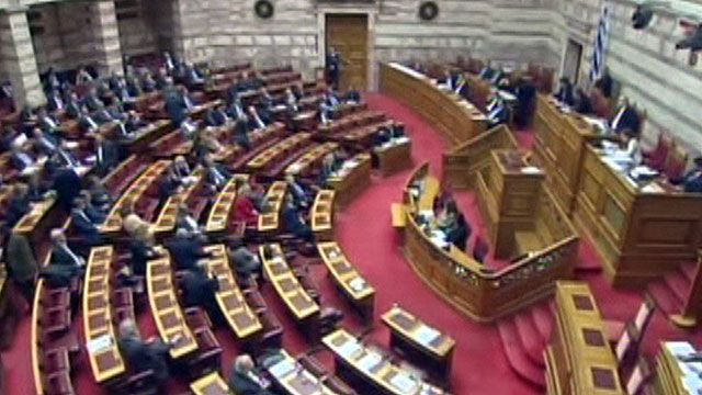 Greek parliament approves spending, pension cuts