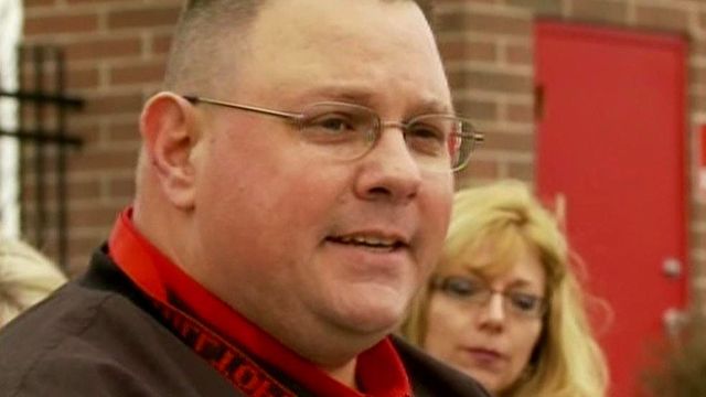 Football coach hailed as hero in Ohio school shooting