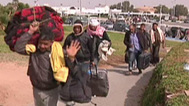 Evacuees Flee Libya to Tunisia 