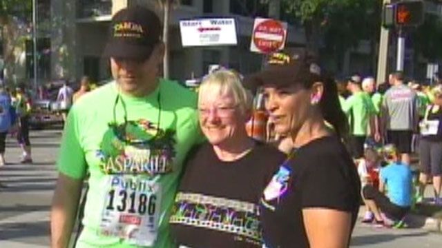 Runner, hero paramedics reunited in Florida