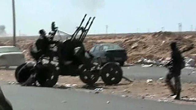 Libyan Jets Pound Rebel Forces