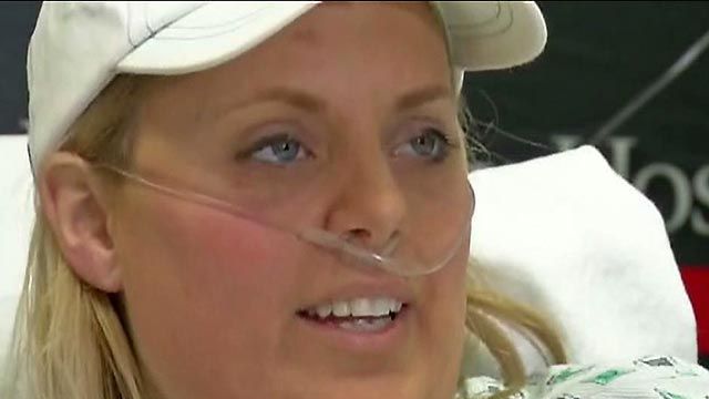 Mom who lost legs in tornado saving her kids speaks out