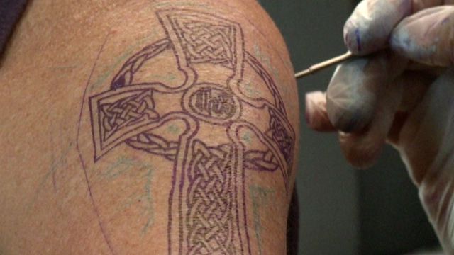 Christian tattoo shop spreads faith through ink