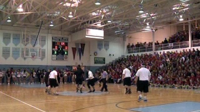 Arch rivals team up for benefit basketball game in Ohio