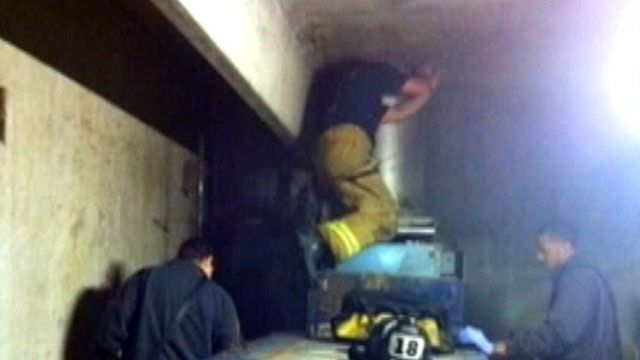 Woman gets trapped inside garbage chute