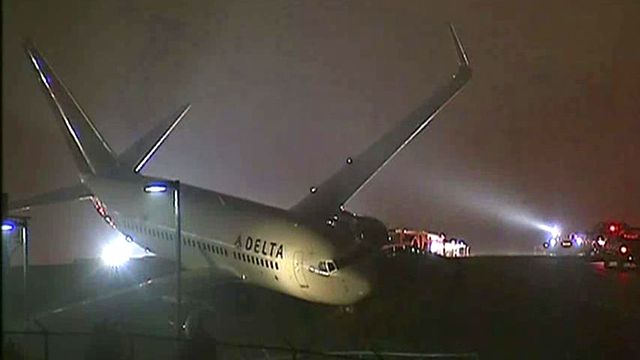 Plane skids off runway in Atlanta