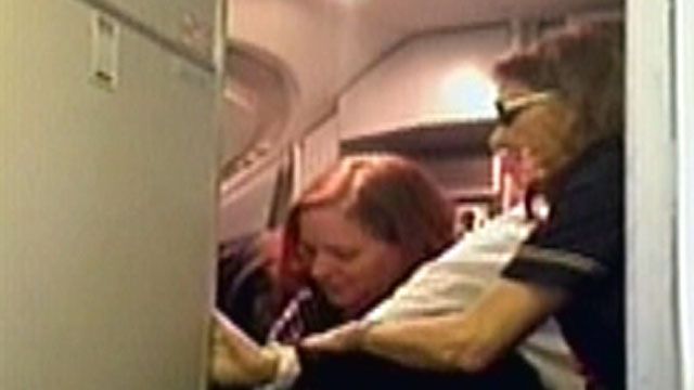 911 tapes released from calls during flight attendant's rant
