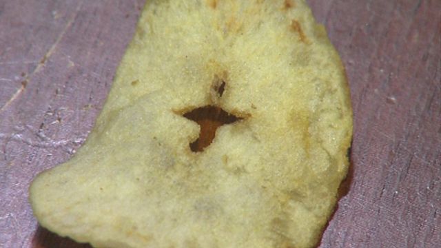 Cross on potato chip a message from above?