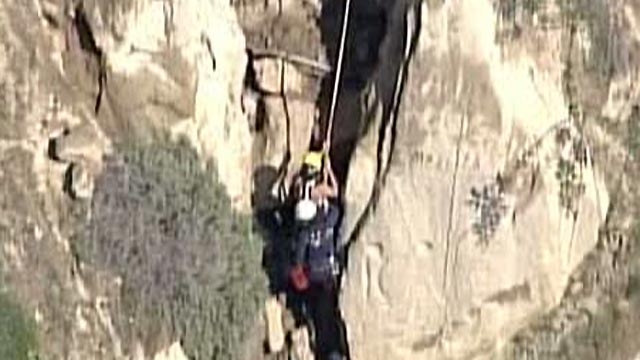 Naked Woman Rescued From Cliff