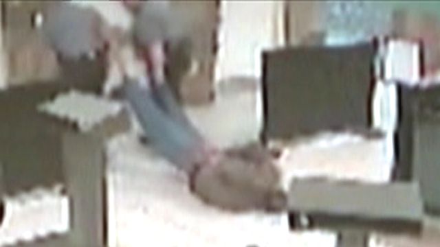 Excessive force? Police drag man across airport floor