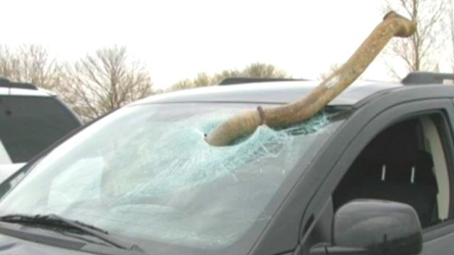 Driver escapes death after tailpipe pierces windshield