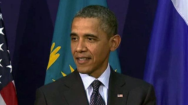 Obama does damage control after open mic comments