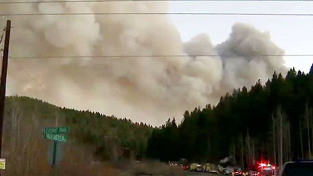 Raging wildfire terrifies Colorado residents