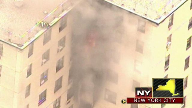 Across America: 3-alarm fire damages Manhattan high-rise