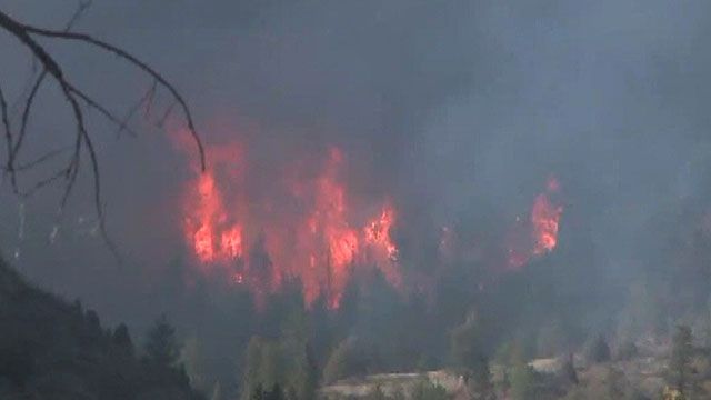 Fire crews make gains against massive wildfire