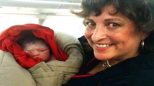 Flight attendants, passengers help deliver baby