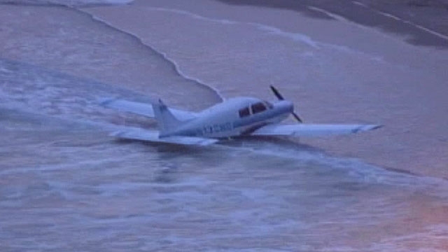 Pilot Lands Small Plane on Beach