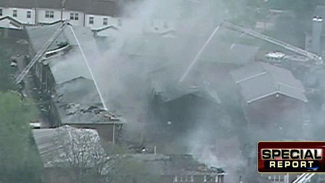 Navy jet crash wipes out part of apartment complex