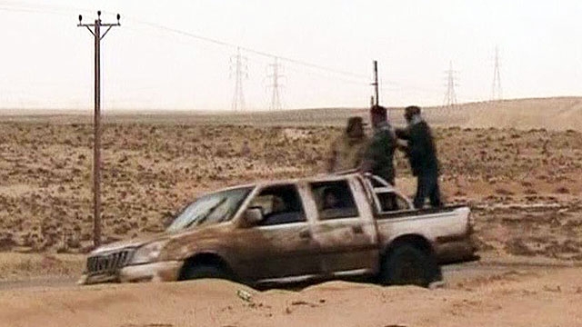 Libyan Rebels on the Run in Brega