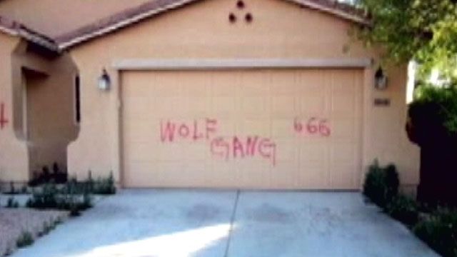 Swastikas, threats spray-painted on Arizona homes