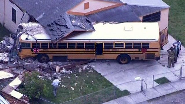 School bus crashes into Florida house