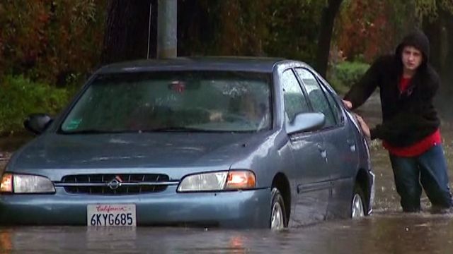 Heavy rain floods roads in California