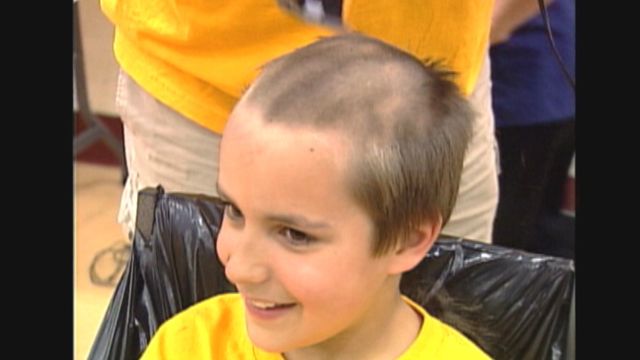 Cub scouts shave heads for friends