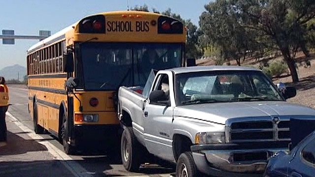 School bus crashes into back of truck