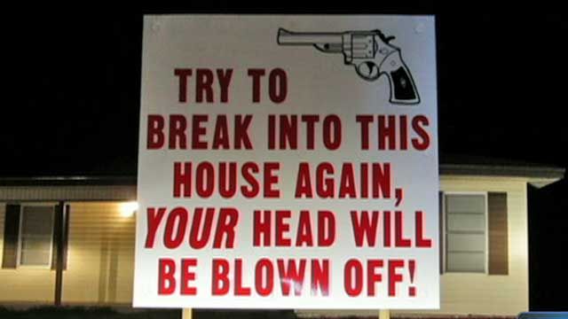 Threatening Sign Outside TX House 