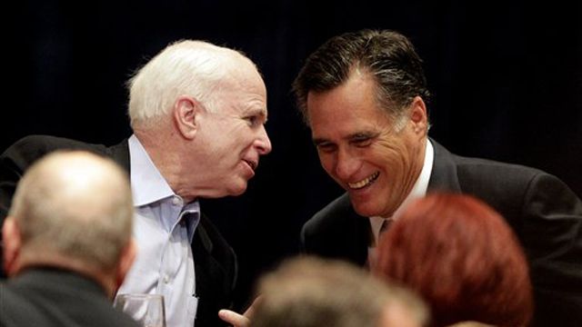 John McCain 'hands the reins' over to Romney