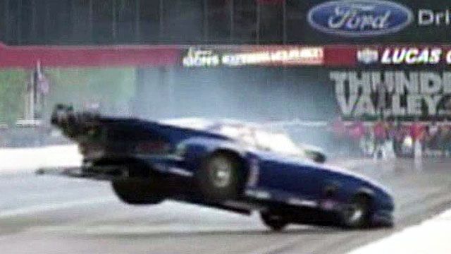 Drag racer destroys camera in spectacular crash