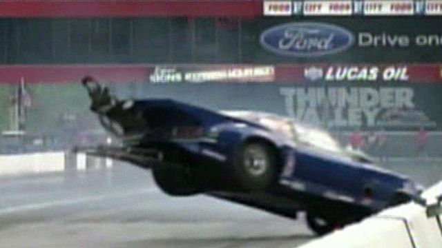 Young drag racer flips car into camera