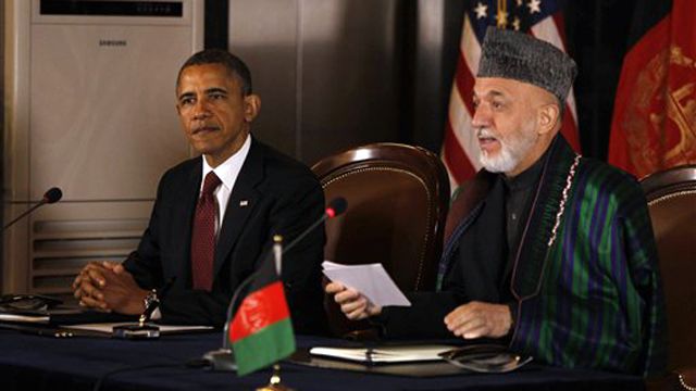 Presidents Obama, Karzai sign partnership agreement 
