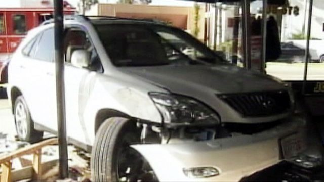 SUV Crashes Through Store Window