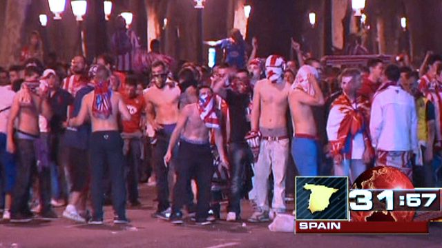 Around the World: Soccer fans riot in Madrid