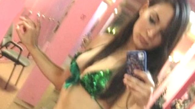 Reporter claims she was fired for being a stripper