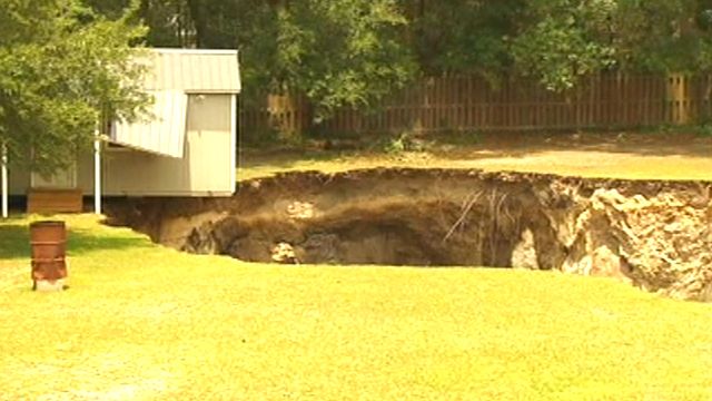 Massive sinkhole threatens Florida home