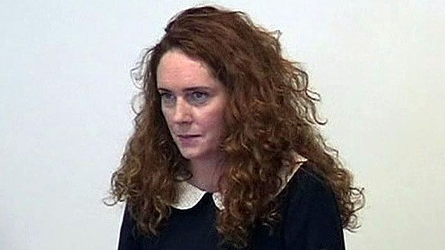 Ex-CEO, husband face charges in U.K. phone hacking scandal