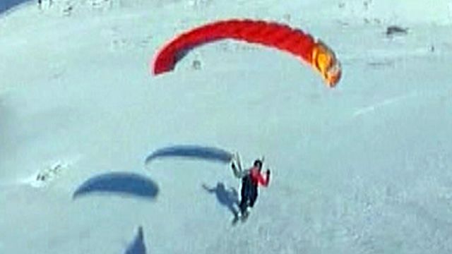 Around the World: 'Speed-flyers' glide down Italy's Mt. Etna