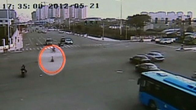Video: Toddler Rides Scooter Into Traffic